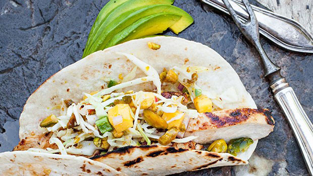 GRILLED CHICKEN TACOS WITH MANGO PISTACHIO SLAW